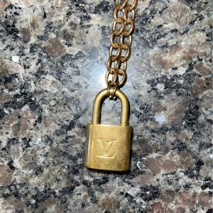 AUTHENTIC LOUIS VUITTON LOCK ON CHAIN